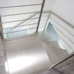 Escalier double quart tournant limon inox brossé