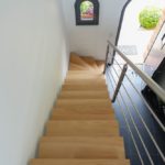 Escalier limon inox brossé et marches chêne