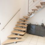 Escalier quart tournant inox et marches Baubuche